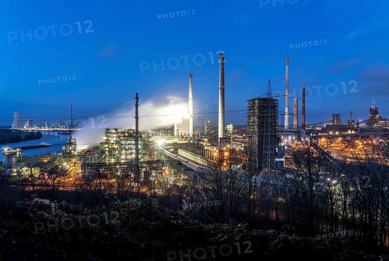 The Thyssenkrupp Steel steelworks in Duisburg-Marxloh, on the Rhine, coking plant unloading tower, blast furnaces 1 and 2, right, STEAG Walsum coal-fired power station, left, North Rhine-Westphalia, Germany, Europe