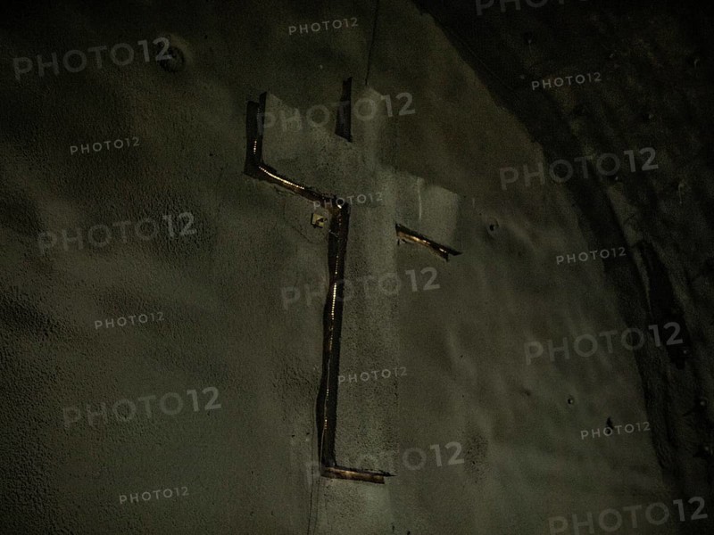 Cross at one end of the tunnel, installed for the Saint Barbara celebration on 4 December 2023, patron saint of miners, in construction lot H53, Brenner Base Tunnel, Wolf, Tyrol, Austria, Europe