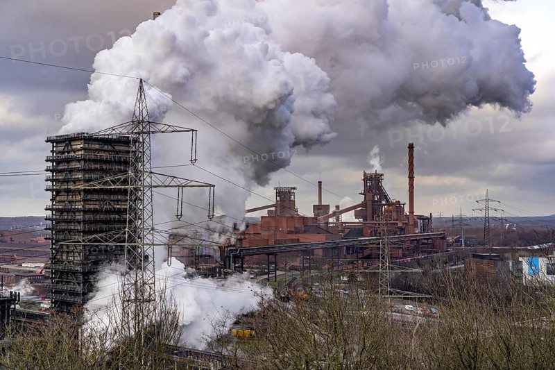 The Thyssenkrupp Steel steelworks in Duisburg-Marxloh, on the Rhine, quenching tower of the coking plant, blast furnaces 1 and 2, right, North Rhine-Westphalia, Germany, Europe