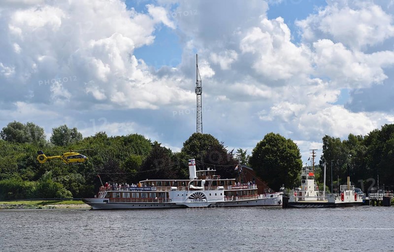 Rescue helicopter near paddle steamer Freya in the Kiel Canal, Kiel Canal, Schleswig-Holstein, Germany, Europe