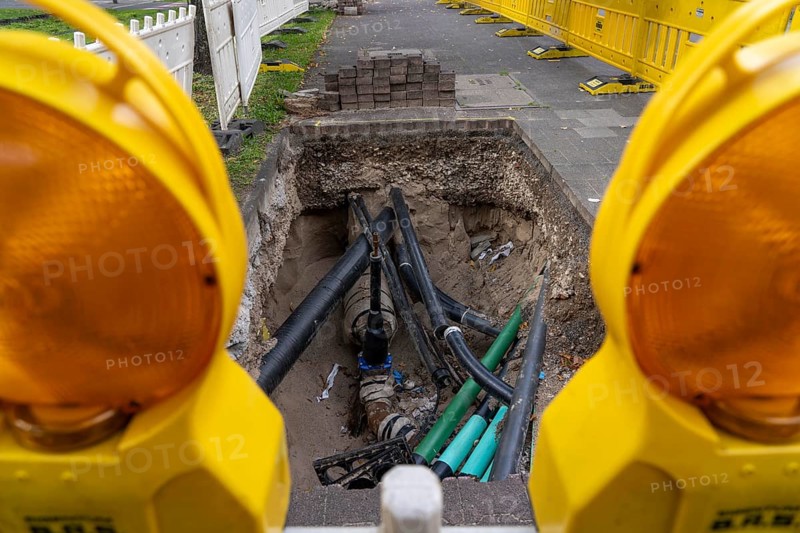 Construction site, excavation pit, work on supply lines, various types, electricity, water, gas, communication, in Düsseldorf North Rhine-Westphalia, Germany, Europe
