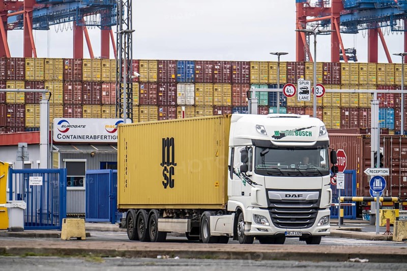 Entry and exit for container lorries, to the MSC container terminal in the seaport of Bremerhaven, Eurogate Container Terminal with almost 50 container gantry cranes, over a length of more than 4 km at the mouth of the Weser, Bremerhaven, Bremen, Germany, Europe