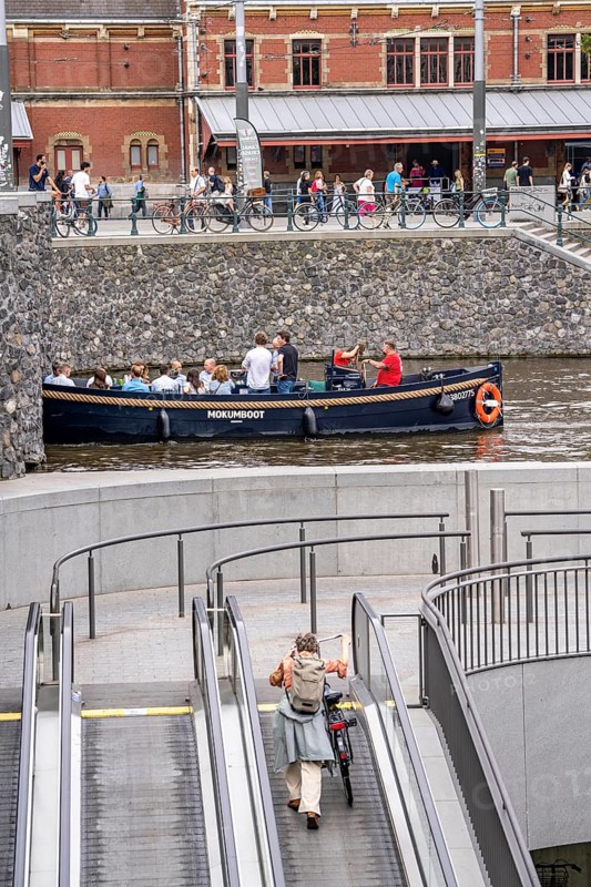 New bicycle car park at Amsterdam Central Station, Stationsplein, space for around 7000 bicycles, largest in Amsterdam, digitally monitored, underground, direct connection to the station and metro, Netherlands, escalators lead to the bicycle garage, Netherlands