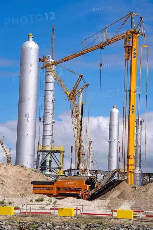 New building, construction site, of a bio-refinery of the Finnish oil company Neste, here, among other things, sustainable bio aviation fuels are to be produced, construction site in the harbour Maasvlakte 2, in Rotterdam, Netherlands