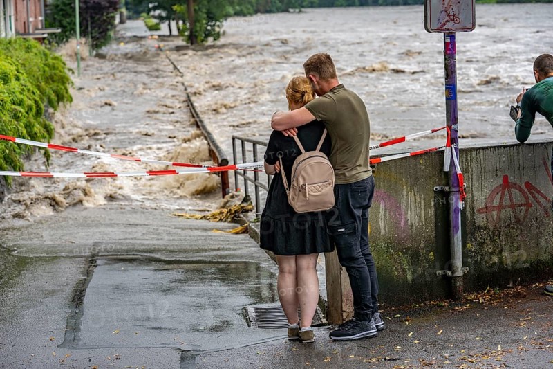 Weir of the Lake Baldeney in Essen, the masses of water roar through the open weirs, spectators, onlookers, high water on the Ruhr, after long heavy rains the river came out of its bed and flooded the landscape and villages, the highest water level ever measured, North Rhine-Westphalia, Germany, Europe
