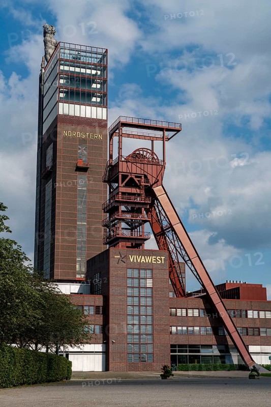 Nordsternpark, former site of Nordstern colliery, pithead tower, Nordstern tower, Hercules sculpture, headquarters of housing provider Vivawest in Gelsenkirchen, North Rhine-Westphalia, Germany, Europe