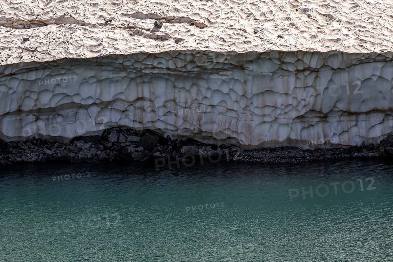 Remains of snow in Lake Sassolo, Lago di Sassolo, Sambuco Valley, Vale Sambuco, near Fusio, Lavizzara, Canton Ticino, Switzerland, Europe