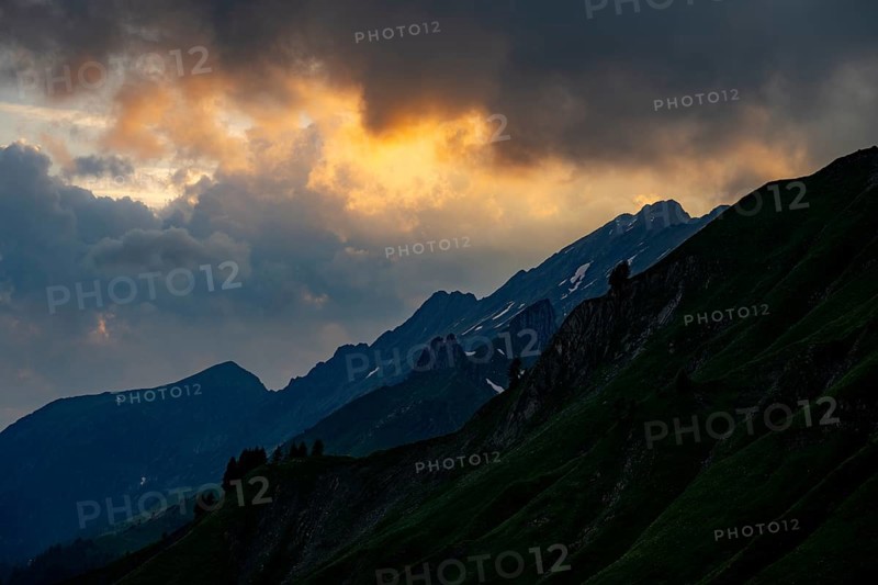 Summit in the morning light with dramatic clouds, Lech, Lechquellengebirge, Vorarlberg, Austria, Europe