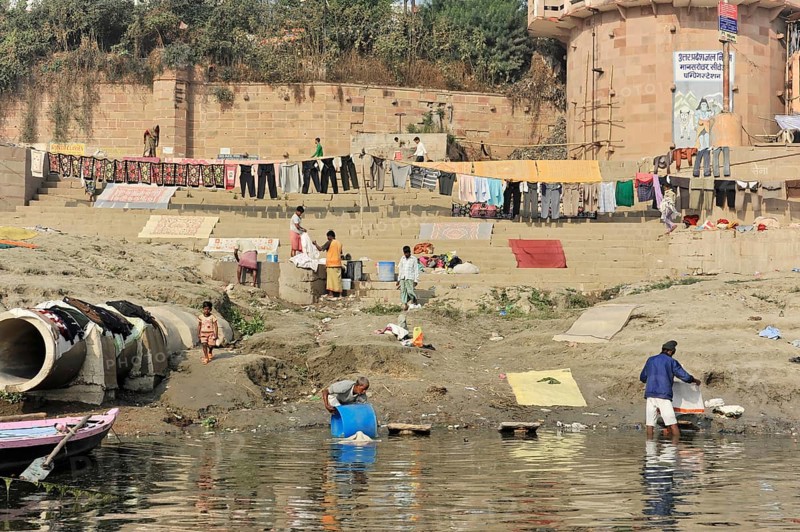 Varanasi, Uttar Pradesh, India, Asia, People on the river bank washing and drying clothes under the sun, Asia