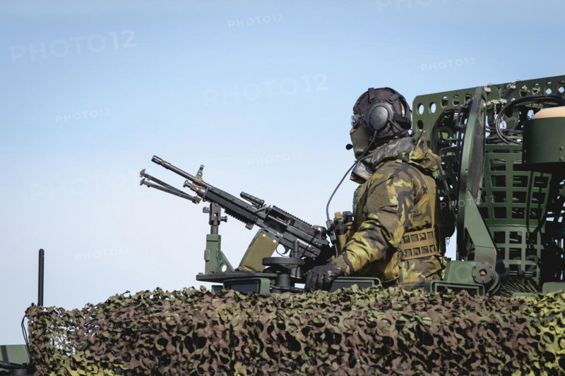 A Czech soldier occupies the hatch of a protected vehicle as part of the military exercise 'Wettiner Schwert' near Tangermünde, 26 March 2024. 'Wettiner Schwert' is part of the Quadriga exercise of the German Armed Forces and the NATO large-scale manoeuvre Steadtfast Defender 2024