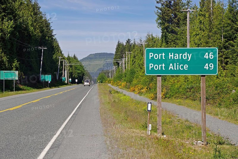 Grader Highway with distance to Port Hardy and Port Alice, Vancouver Island, British Columbia, Canada, North America