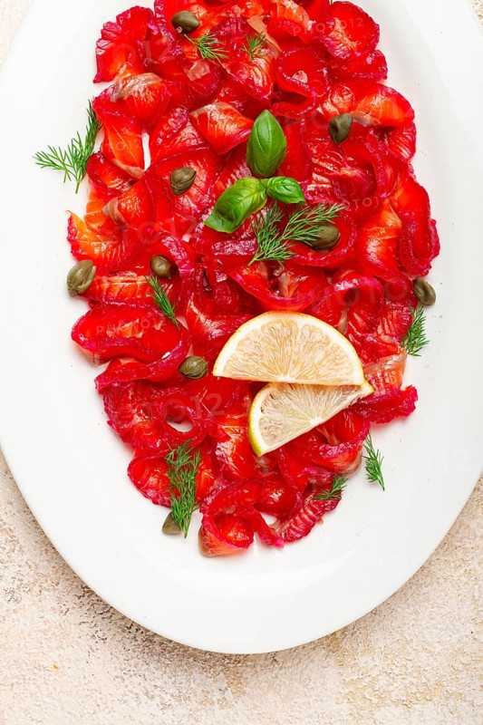 Salmon gravlax with beetroot, Scandinavian snack, beet gravlax, lightly salted fish, homemade, no people