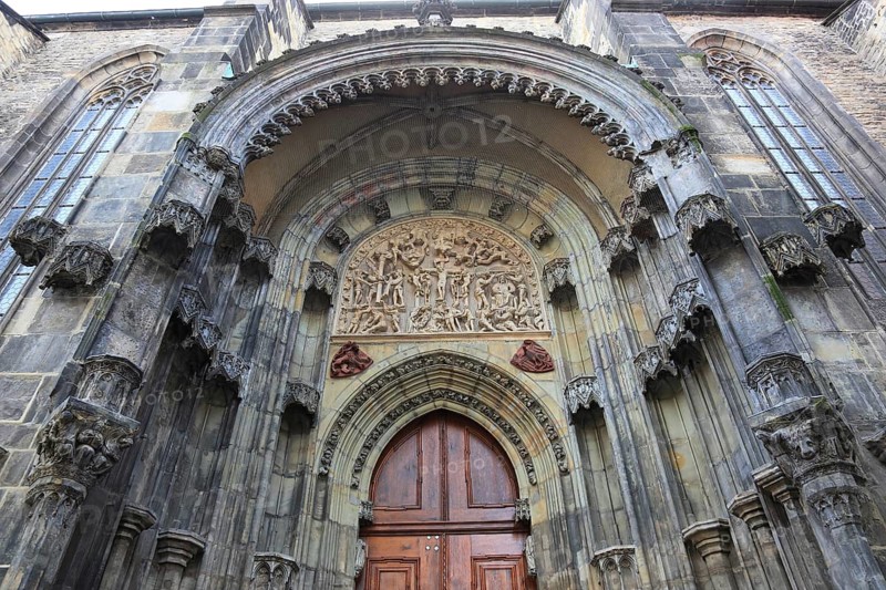 The north portal with tympanum of the Teyn Church, a Roman Catholic church of the Virgin Mary in front of the Teyn in Prague's Old Town on the Old Town Square, Prague, Czech Republic, Europe