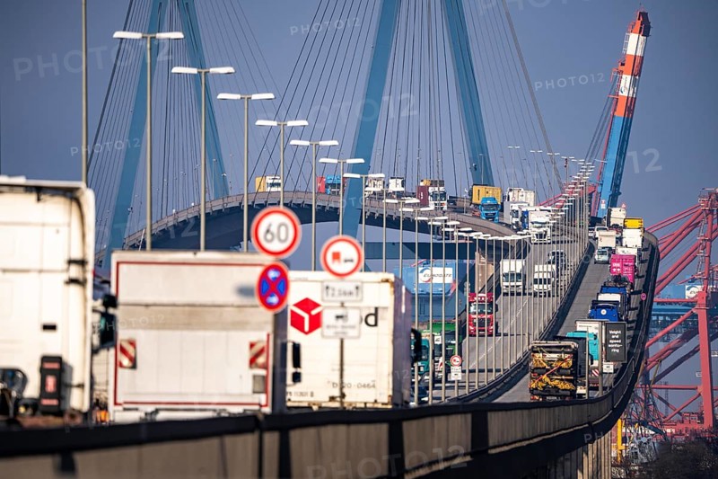 Traffic on the Köhlbrand Bridge in the port of Hamburg, spans the 325 m wide Köhlbrand, an arm of the Süderelbe, the bridge is over 3600 metres long, 53 metres above the water, piers 135 m high, more than 30, 000 vehicles use the B3 bridge daily, important connection to the port, it is dilapidated, to be rebuilt, Hamburg, Germany, Europe