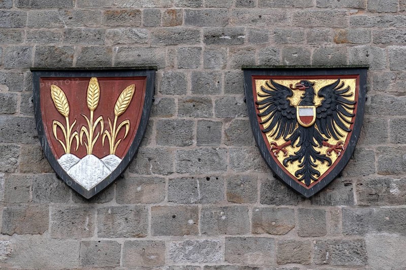Spelt and imperial eagle in the coat of arms at the Wörnitz Gate, Dinkelsbühl, Bavaria, Germany, Europe