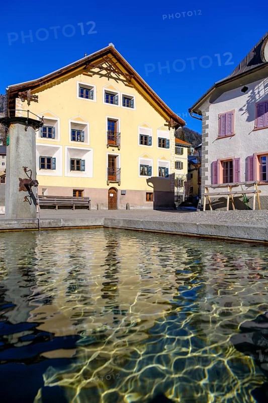 Fountain on the village square, Sent near Scuol, Engadin, Graubünden, Switzerland, Europe