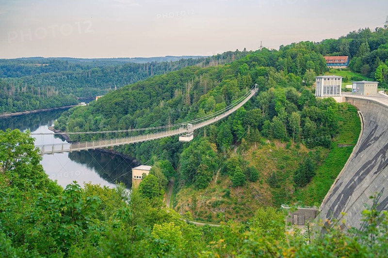 Dam with suspension bridge, surrounded by forest and water, Rappbode Dam, Harz Mountains, Germany, Europe