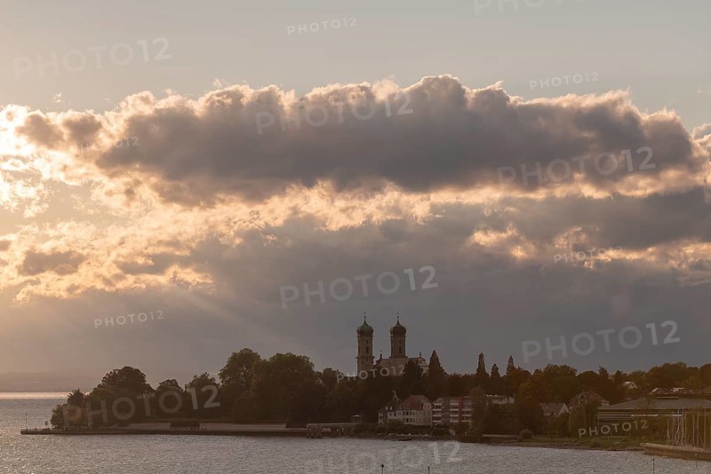 Baroque castle church, double tower, onion dome, evening light, sunbeams, Friedrichshafen on Lake Constance Baden-Württemberg, Germany, Europe
