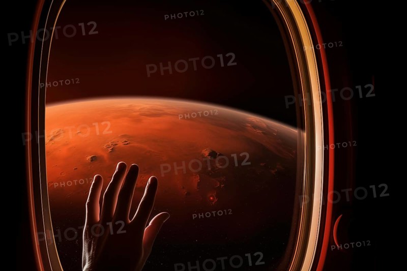 Mars landscape seen through spaceship window illuminator with astronaut hand touching the glass. Concept of extraterrestrial journey space exploration, conveys sense of otherworldly beauty and wonder, AI generated