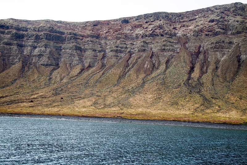 Steep gullied cliffs near Punta Fariones, Chinijo Archipelago, Orzola, Lanzarote, Canary Islands, Spain, Europe