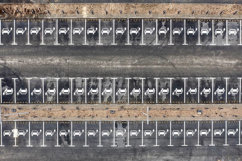 Aerial view of charging stations for electric cars at the Tesla Gigafactory in Grünheide, 28 01 2023