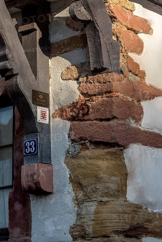 Coloured sandstone under plaster, sandstone, Burgmannenhaus, historic half-timbered house, cultural monument, medieval Friedberg castle, old town, Friedberg, Wetterau, Hesse, Germany, Europe