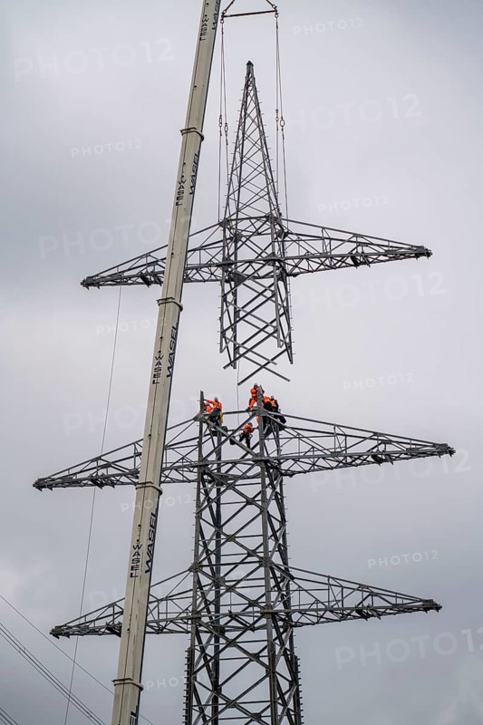 Installation of a high-voltage pylon, construction of a new line route, near Neuss-Holzheim, North Rhine-Westphalia, Germany, Europe