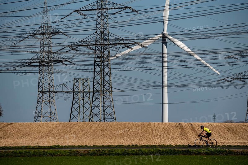 Part of a line route, 380 KV extra-high-voltage line, wind turbine, near Hüchelhoven, district town of Bergheim, Rhein-Kreis-Neuss, North Rhine-Westphalia, Germany, Europe