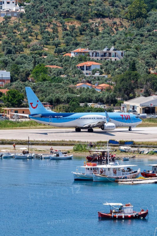 A TUI Airways Boeing 737-800 aircraft with the registration G-TAWD at Skiathos Airport, Greece, Europe