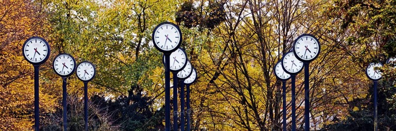 Artwork Time field, 24 synchronised station clocks, Artist Klaus Rinke, Time changeover, Volksgarten, Düsseldorf, North Rhine-Westphalia, Germany, Europe