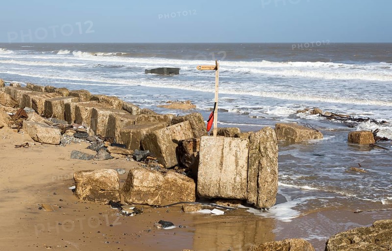 March 20 2018 Hemsby, UK. Coast path sign left abandoned by coastal erosion at Hemsby, Norfolk, England, UK
