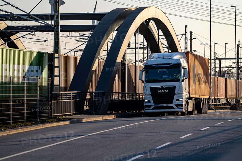 Bridge in the Port of Hamburg, behind, in front lorry on Waltershoferdam, access to HHLA Container Terminal Burchardkai, goods train route to, from HHLA Container Terminal Burchardkai, Hamburg, Germany, Europe