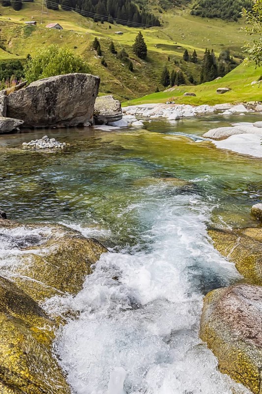 Rein da Christallina torrent near Medel. Pools with crystal-clear water in the riverbed. Canton of Graubünden, Switzerland, Europe