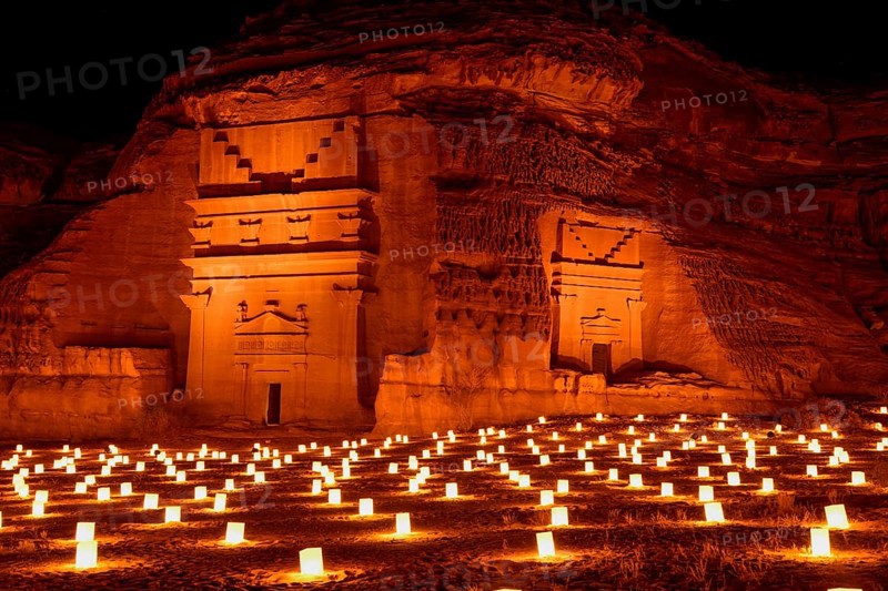 Illuminated Nabataean tombs at night, Hegra or Madain Salih, AlUla region, Medina province, Saudi Arabia, Arabian Peninsula, Asia