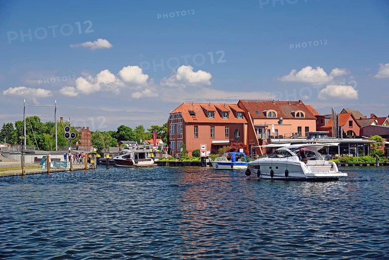 Europe, Germany, Mecklenburg-Western Pomerania, island town of Malchow, Lake Malchow, at the swing bridge, motor yacht, Malchow, Mecklenburg-Western Pomerania, Germany, Europe