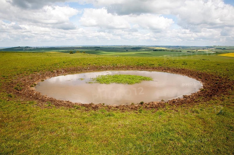 Dew pond water supply on the top of Tan Hill, All Cannings, Wiltshire, England, United Kingdom, Europe