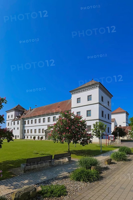Meßkirch Castle, Castle of the Counts of Zimmern, Zimmern Castle, regular four-wing castle complex, Renaissance building, architecture, historical building, east view, park, castle garden, window, facade, benches, blue sky, Meßkirch, Sigmaringen district, Baden-Württemberg. Germany