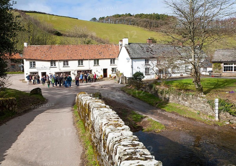 Groups of people outside Lorna Doone Farm, Malmsmead, Exmoor national park, Devon, England, United Kingdom, Europe