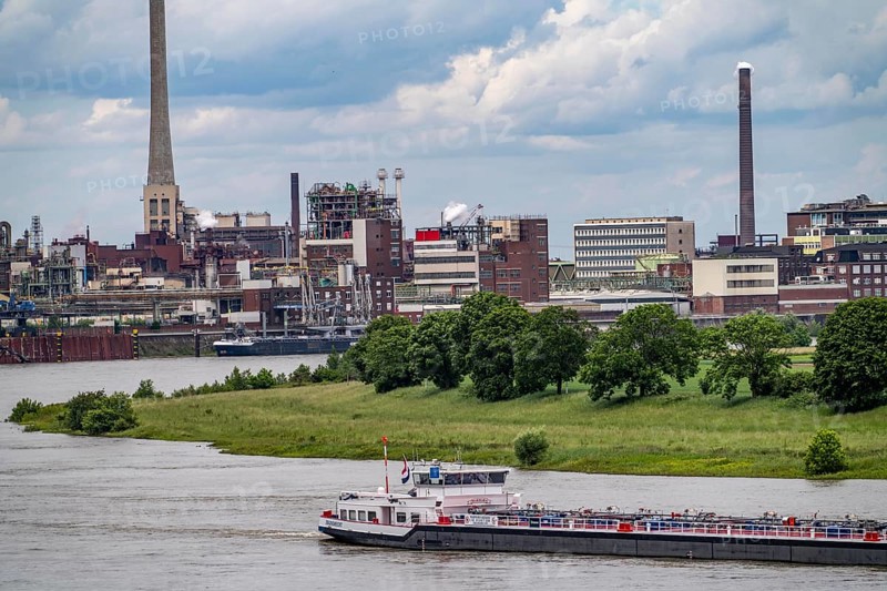 Chempark Krefeld-Ürdingen, around 40 companies are located in the chemical park on the Rhine, there are 3 chemical parks in North Rhine-Westphalia, cargo ship on the Rhine, Germany, Europe