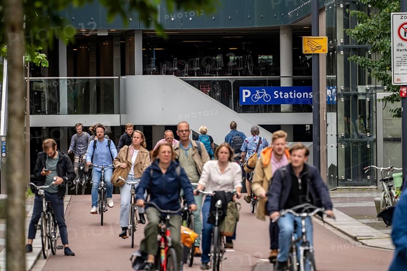 Entrance and exit of the bicycle car park at Utrecht Centraal station, Stationsplein, over 13, 000 parking spaces, considered the largest bicycle car park in the world, over 3 underground floors, Utrecht, Netherlands
