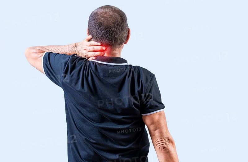 People suffering with neck pain isolated. Rear view of Mature man with neck tension isolated. Neck pain and stress concept