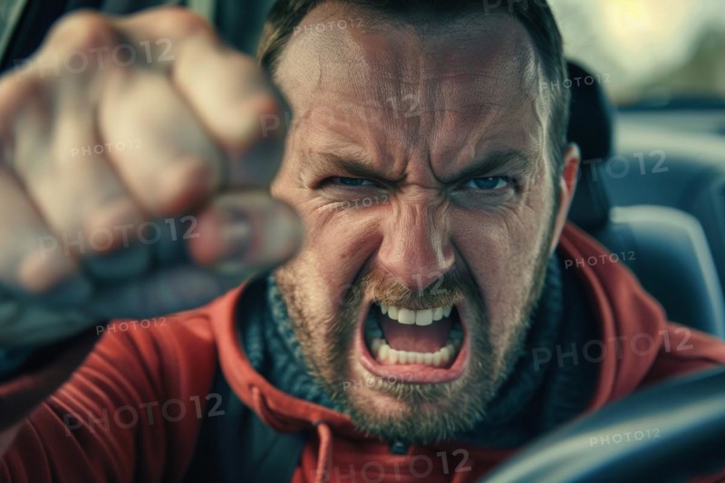 Angry, unnerved, aggressive, screaming man sitting behind the steering wheel and gesticulating wildly with his fist, symbolic image for aggressive behaviour in road traffic, AI generated, AI generated, AI generated