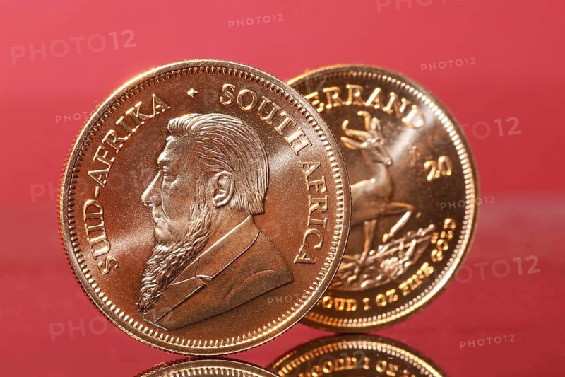 Close-up of two Krugerrand gold coins