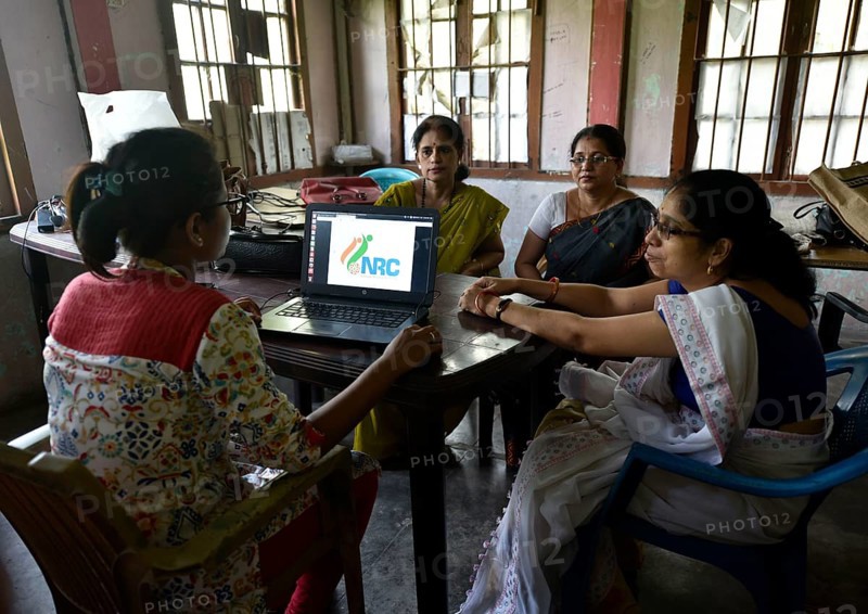 Officials checks the documents submitted by people at an National Register of Citizens (NRC) Seva Kendra in Guwahati, Assam, India on Aug 30, 2019. The NRC with the final list of citizens will be published tomorrow on August 31, 2019