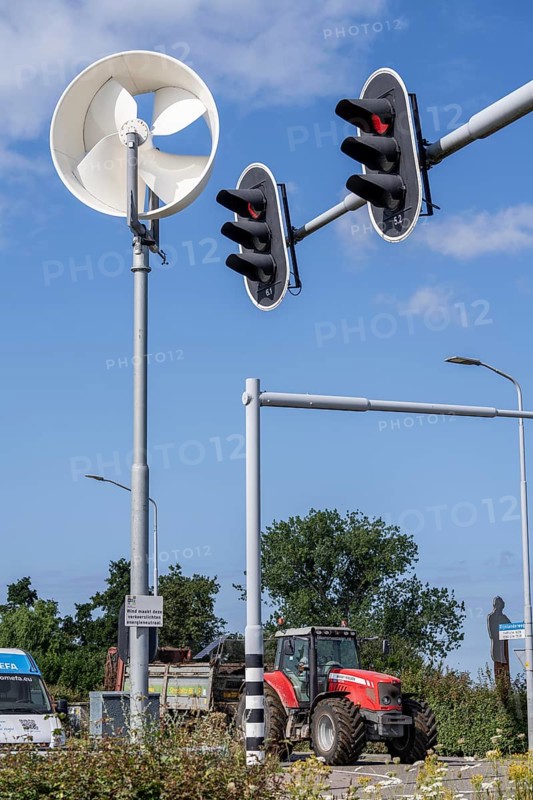 A mini wind power plant in the small Dutch town of Haarlemmermeer supplies the traffic lights at a road junction with electricity, test facility to test the effectiveness of such mini windmills to supply other areas, such as street lighting, with climate-neutral energy, Bennebroekerweg junction, Rijnlanderweg, Netherlands