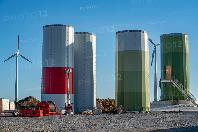 Construction site of a new wind turbine, modules of the tower, wind turbine from the manufacturer Enercon, wind farm near Bad Wünnenberg, North Rhine-Westphalia, Germany, Europe