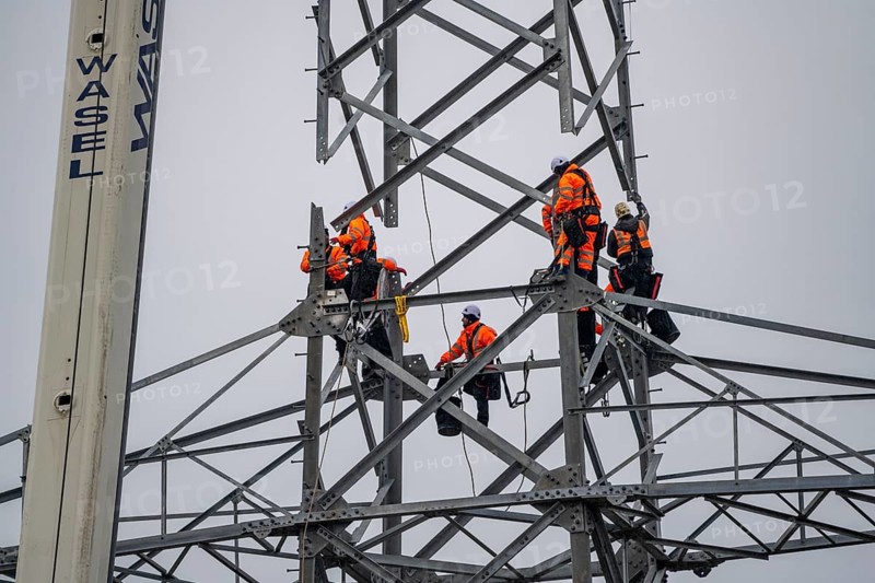 Installation of a high-voltage pylon, construction of a new line route, near Neuss-Holzheim, North Rhine-Westphalia, Germany, Europe