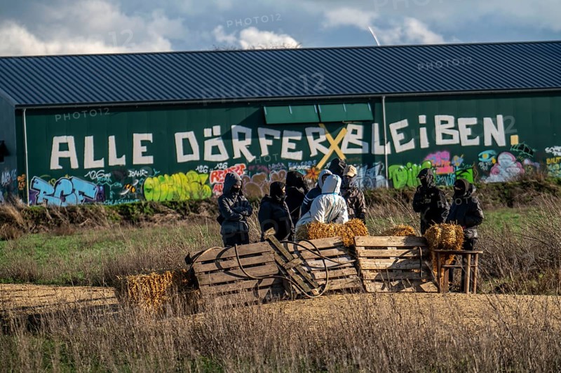 Barricades at the camp, start of the eviction of the hamlet Lützerath at the lignite mine Garzweiler 2, activists try to obstruct the preparation for the upcoming eviction of the site, which is occupied by climate protection activists, the energy company RWE prepares the construction of work roads, protected by the police, North Rhine-Westphalia, Germany, Europe