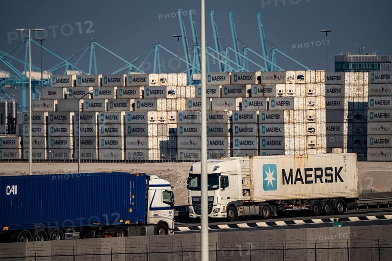 The seaport of Rotterdam, Netherlands, Maasvlakte 2 deep-sea harbour, on an artificial land area off the original coast, MAERSK container storage, trucks, Rotterdam, Netherlands
