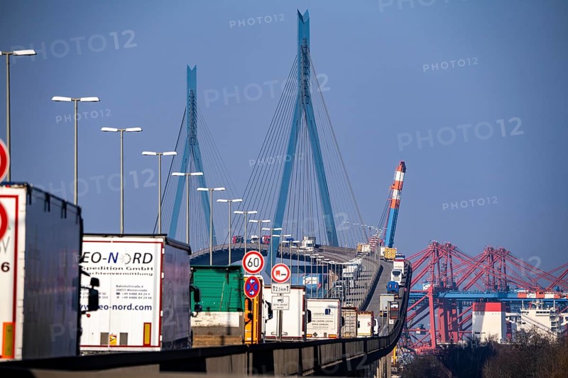 Traffic on the Köhlbrand Bridge in the port of Hamburg, spans the 325 m wide Köhlbrand, an arm of the Süderelbe, the bridge is over 3600 metres long, 53 metres above the water, piers 135 m high, more than 30, 000 vehicles use the B3 bridge daily, important connection to the port, it is dilapidated, to be rebuilt, Hamburg, Germany, Europe